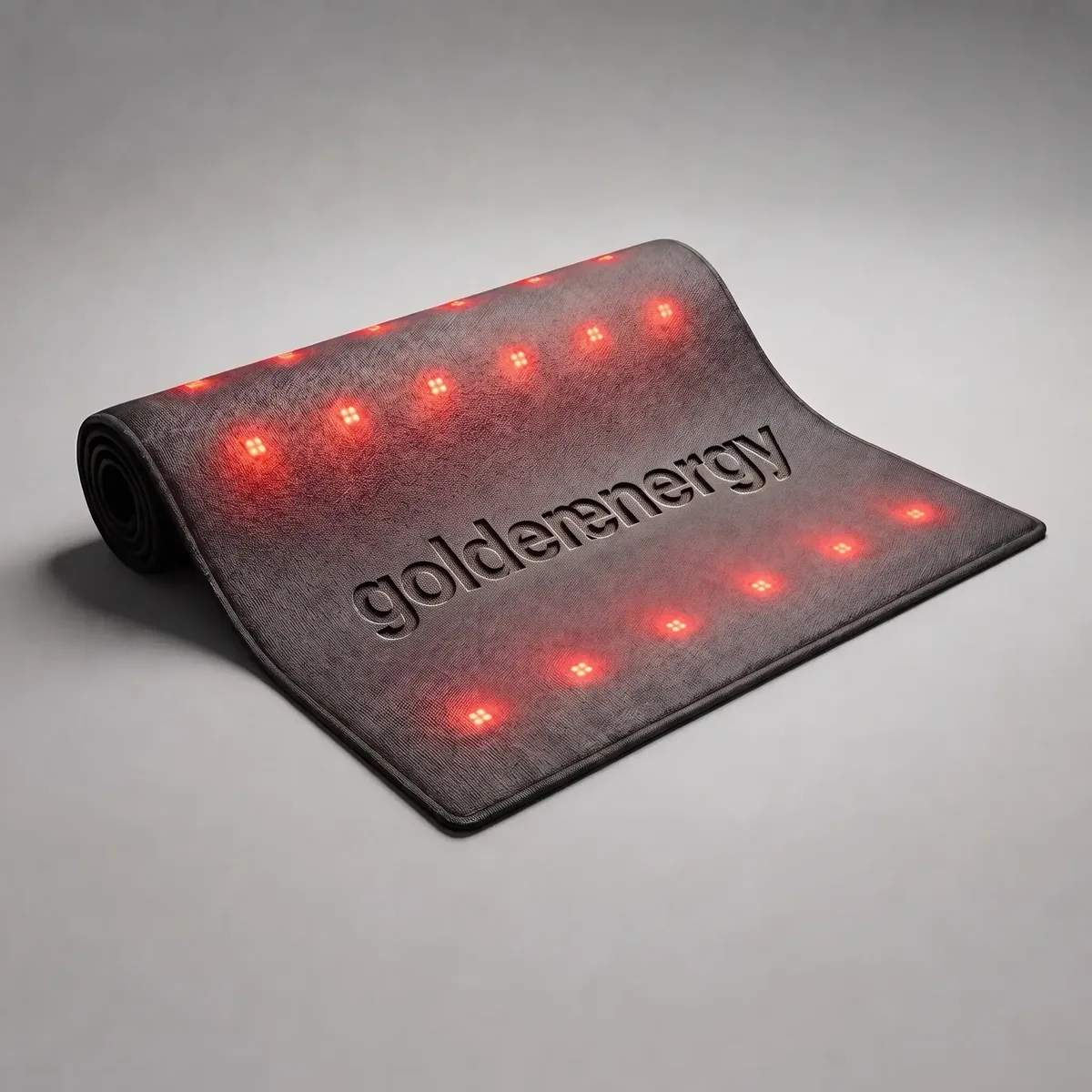Golden Energy red-light therapy mat with glowing LEDs